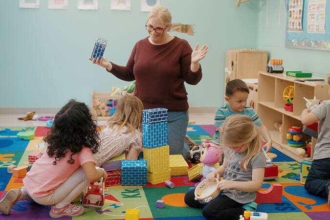 Teacher with Students playing